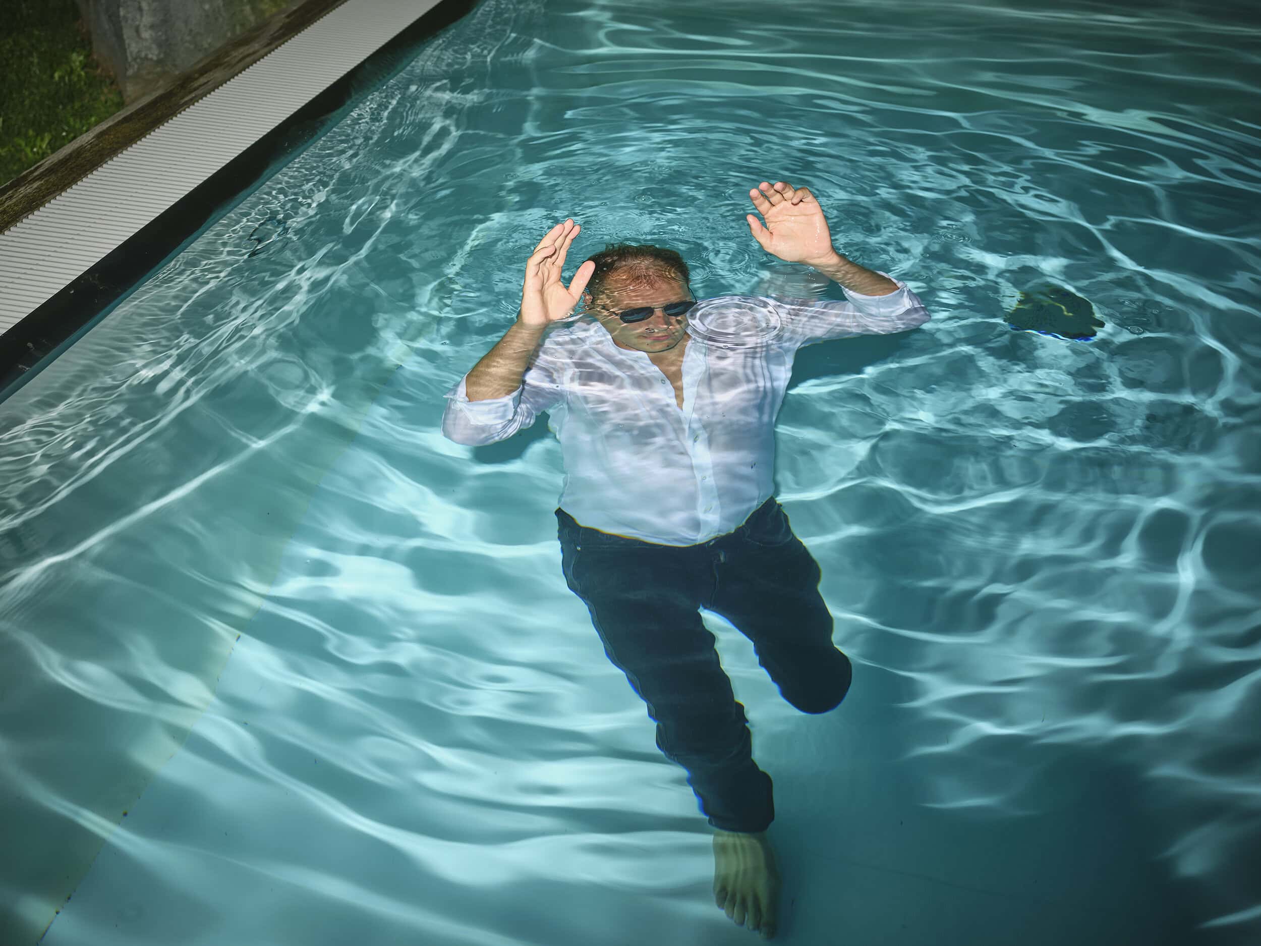 Kultur im Vulkanland, Campaign Photography, Man standing in a pool